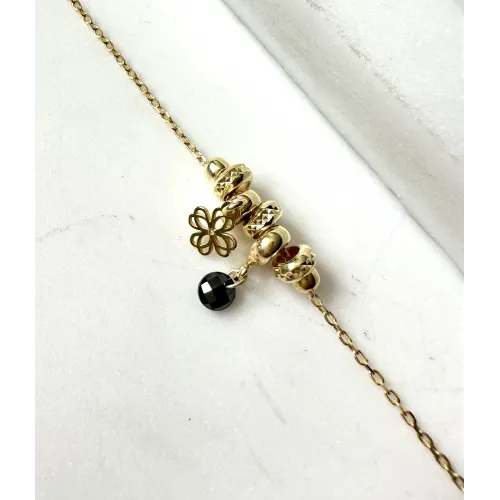 pozlacana-bransoletka-wieloelementowa-azurowa-koniczynka